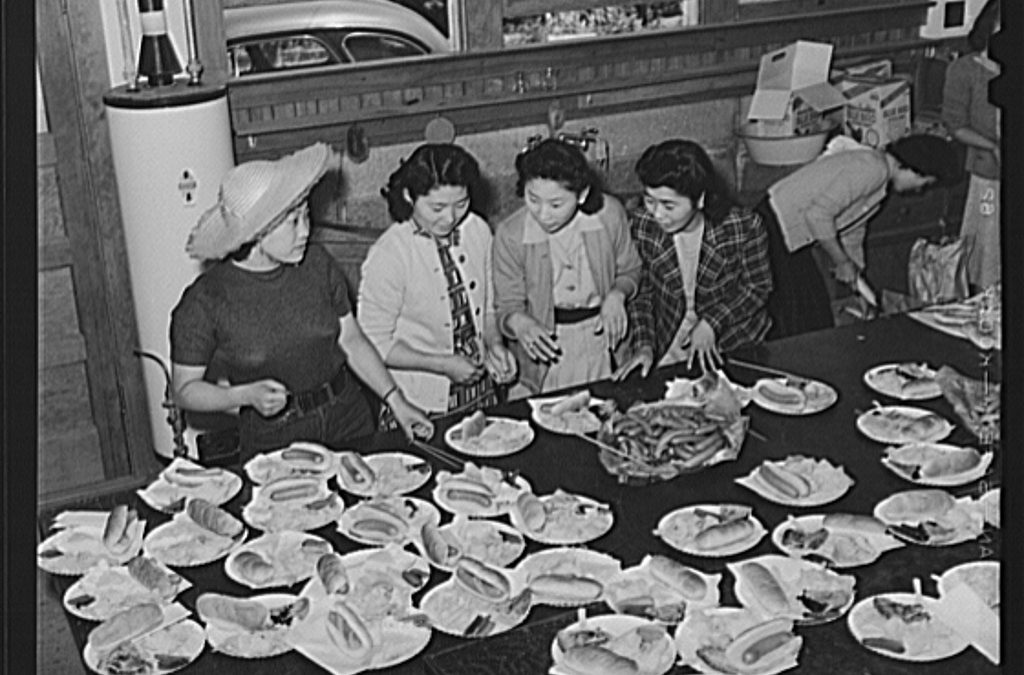 Russell Lee’s San Benito County, California. Japanese-American girls prepare picnic lunch for members of the Japanese-American Citizens League just before their evacuation (1942)